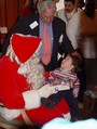 Another happy child with Santa.